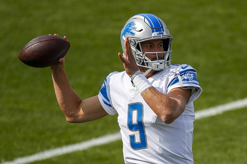 FILE: Detroit Lions' Matthew Stafford warms up before an NFL football game against the Green Bay Packers Sunday, Sept. 20, 2020, in Green Bay, Wis. (AP Photo/Matt Ludtke)


