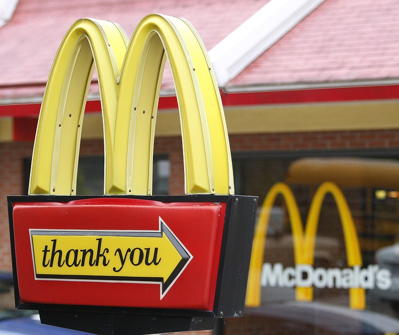 FILE - This Oct. 14, 2009 file shows the red and yellow signs with the trademark golden arches of a McDonald's in Pittsburgh. (AP Photo/Keith Srakocic, File)