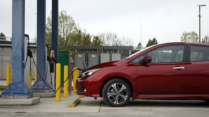 Staff photo by C.B. Schmelter / The Nissan Leaf is seen at a charging station at Coolidge Park on Monday, March 30, 2020 in Chattanooga, Tenn.
