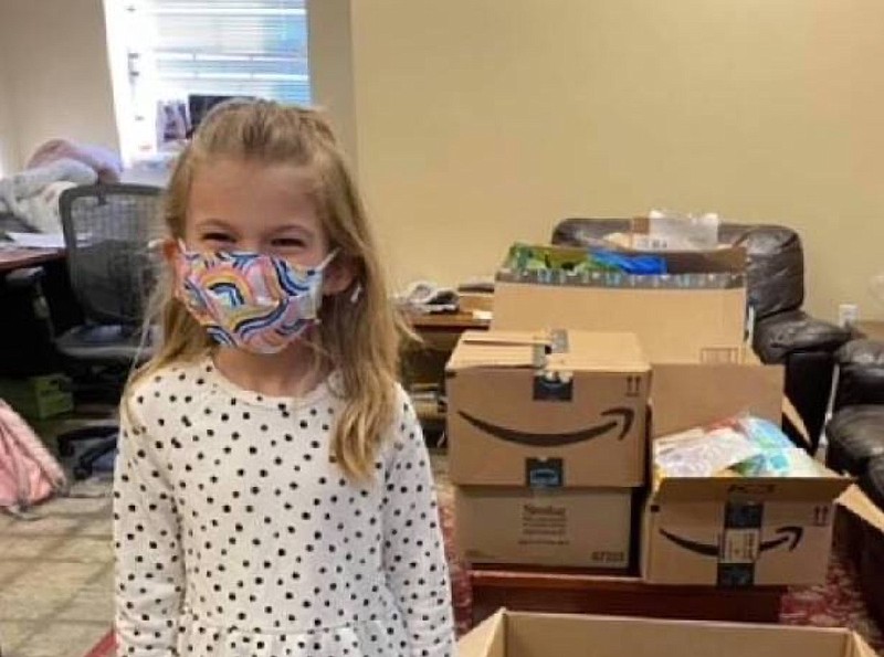 Billie Millsaps, 7, donates supplies to Room at the Inn, a shelter for homeless women and children. It's Billie's way of making 2021 a "year of doing good." Contributed photo by Chelsy Millsaps.
