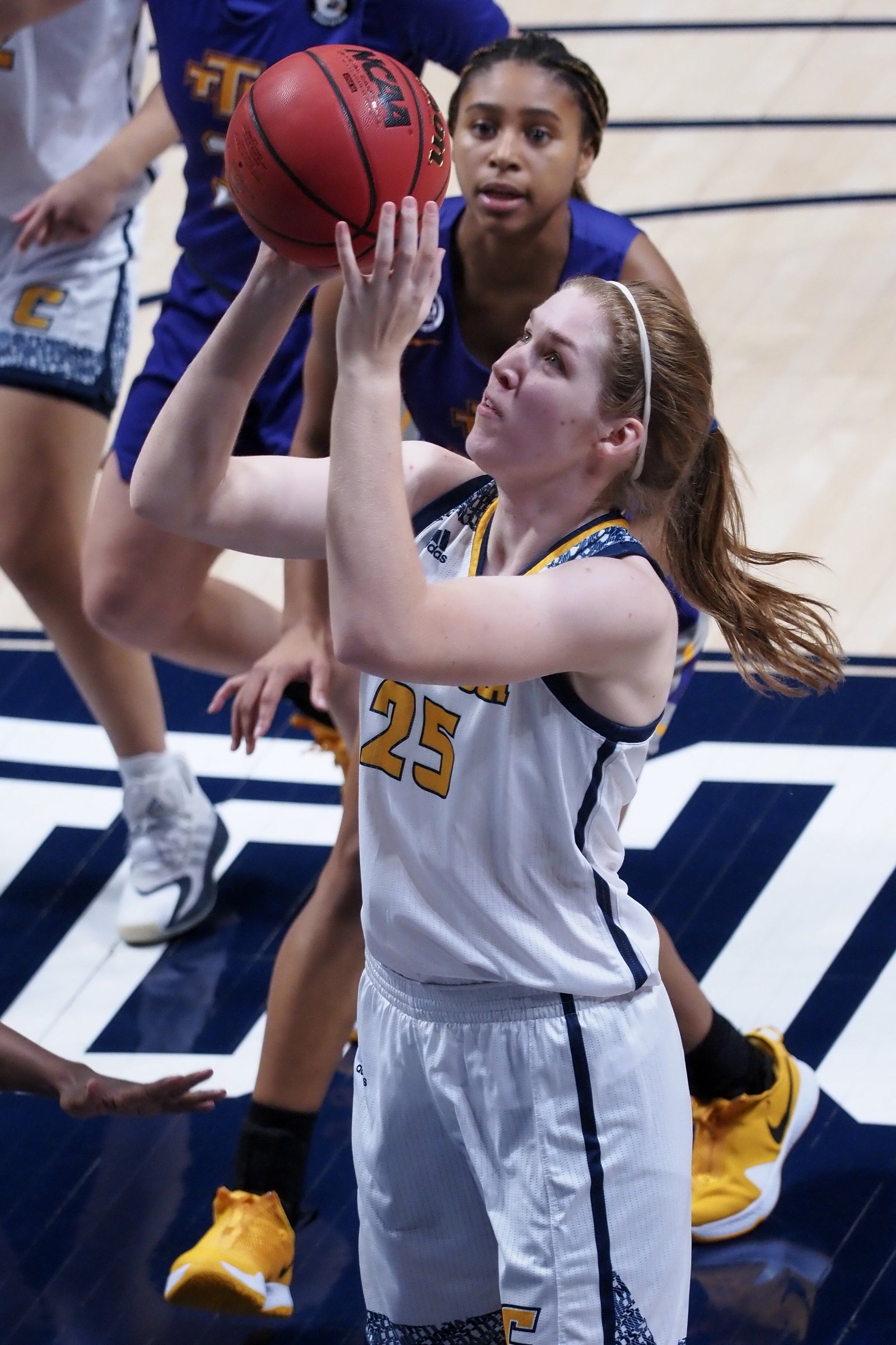 Staff photo by C.B. Schmelter / UTC junior forward Abbey Cornelius shoots during a Dec. 11 home game against Tennessee Tech.