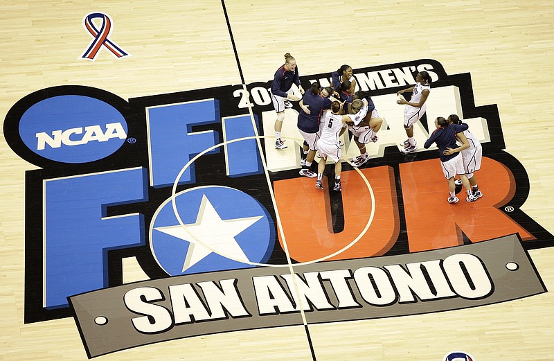 AP photo by Eric Gay / Connecticut players celebrate after winning the NCAA Division I women's basketball title against Stanford on April 6, 2010, in San Antonio. The San Antonio region will host the entire 64-team event this year, although some early games will be held as far as 80 miles away.