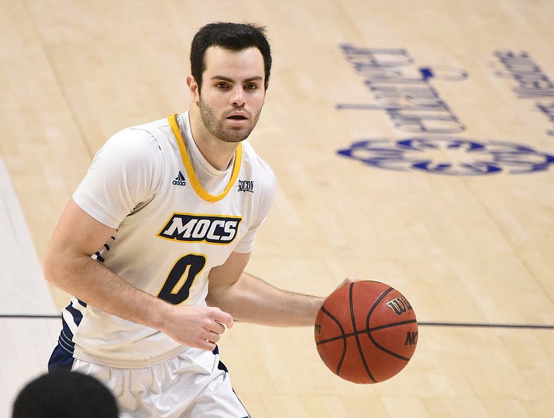 Staff file photo by Matt Hamilton / UTC's A.J. Caldwell made a 3-pointer with one second remaining to lift the Mocs to a 67-65 win Saturday at East Tennessee State.