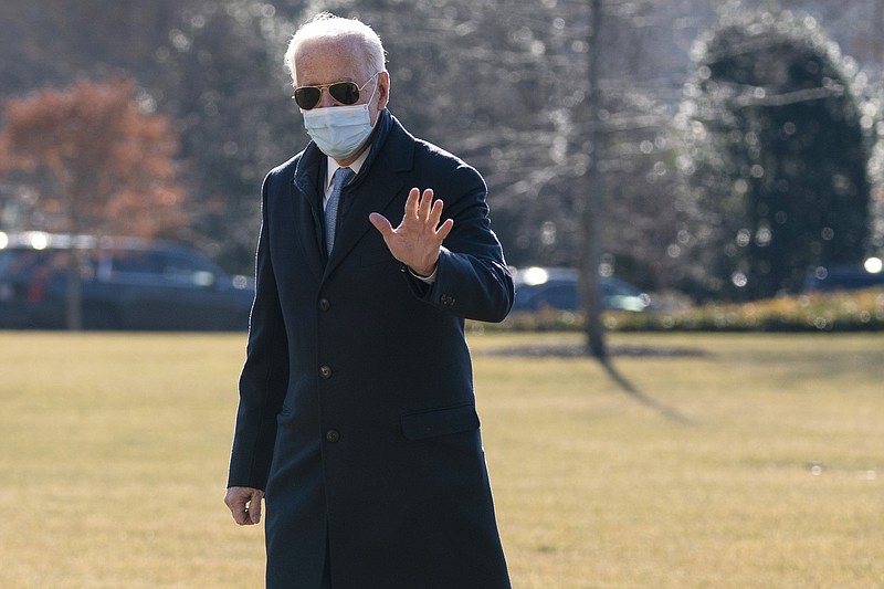 The Associated Press / President Joe Biden waves to reporters as he arrives on the South Lawn of the White House in Washington, D.C., on Monday.