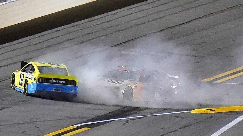 Drivers Ryan Blaney (12) and Chase Elliott crash during the final lap of the NASCAR Busch Clash race on Tuesday at Daytona International Speedway.