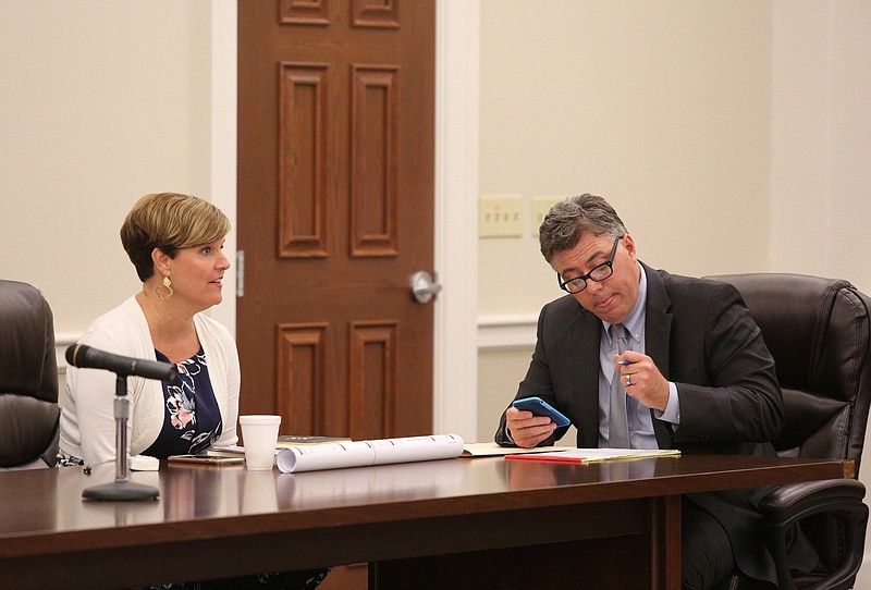 Staff file photo / Catoosa County Manager Alicia Vaughn sits beside Catoosa County Attorney Chad Young in a 2019 file photo.