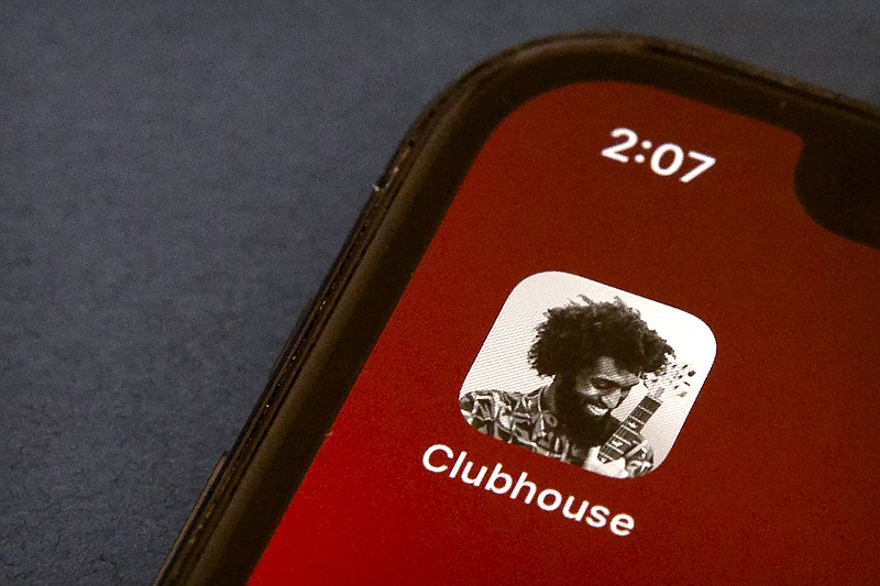 The icon for the social media app Clubhouse is seen on a smartphone screen in Beijing, Tuesday, Feb. 9, 2021. Clubhouse, an invitation-only audio chat app launched less than a year ago, has caught the attention of tech industry bigshots like Tesla CEO Elon Musk and Facebook CEO Mark Zuckerberg, not to mention the Chinese government, which has already blocked it in the country. (AP Photo/Mark Schiefelbein)
