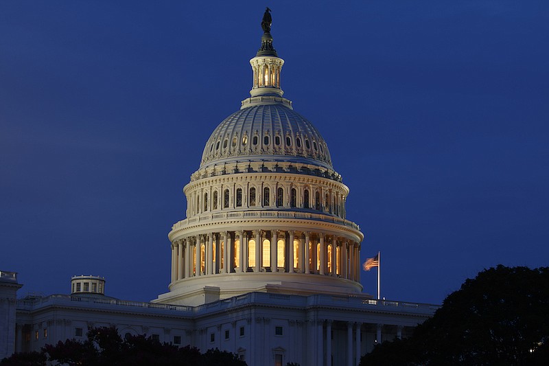 This July 16, 2019, file photo shows the Capitol Dome in Washington. The U.S. government's budget deficit hit $735.7 billion through the first four months of the budget year, an all-time high for the period, as a pandemic-induced recession cut into tax revenues while spending on COVID relief measures sent outlays soaring. The Treasury Department reported Wednesday, Feb. 10, 2021, that the deficit so far for the budget year that began Oct. 1 is 89% higher than the $389.2 billion deficit run up in the same period a year ago. (AP Photo/Carolyn Kaster, File)