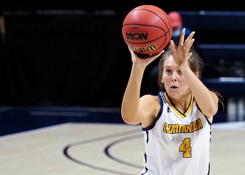 Staff photo by C.B. Schmelter / UTC freshman forward Anna Walker shoots a 3-pointer during Thursday's SoCon game against Western Carolina at McKenzie Arena. Walker led the Mocs with 16 points as they won 74-45.