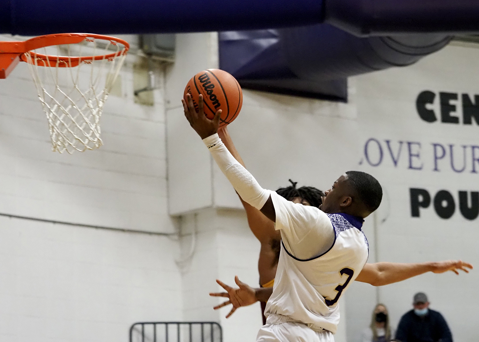 Staff photo by C.B. Schmelter / Central's Kenneth Steward (3) goes up towards the basket against Tyner at Central High School on Friday, Feb. 12, 2021 in Chattanooga, Tenn.