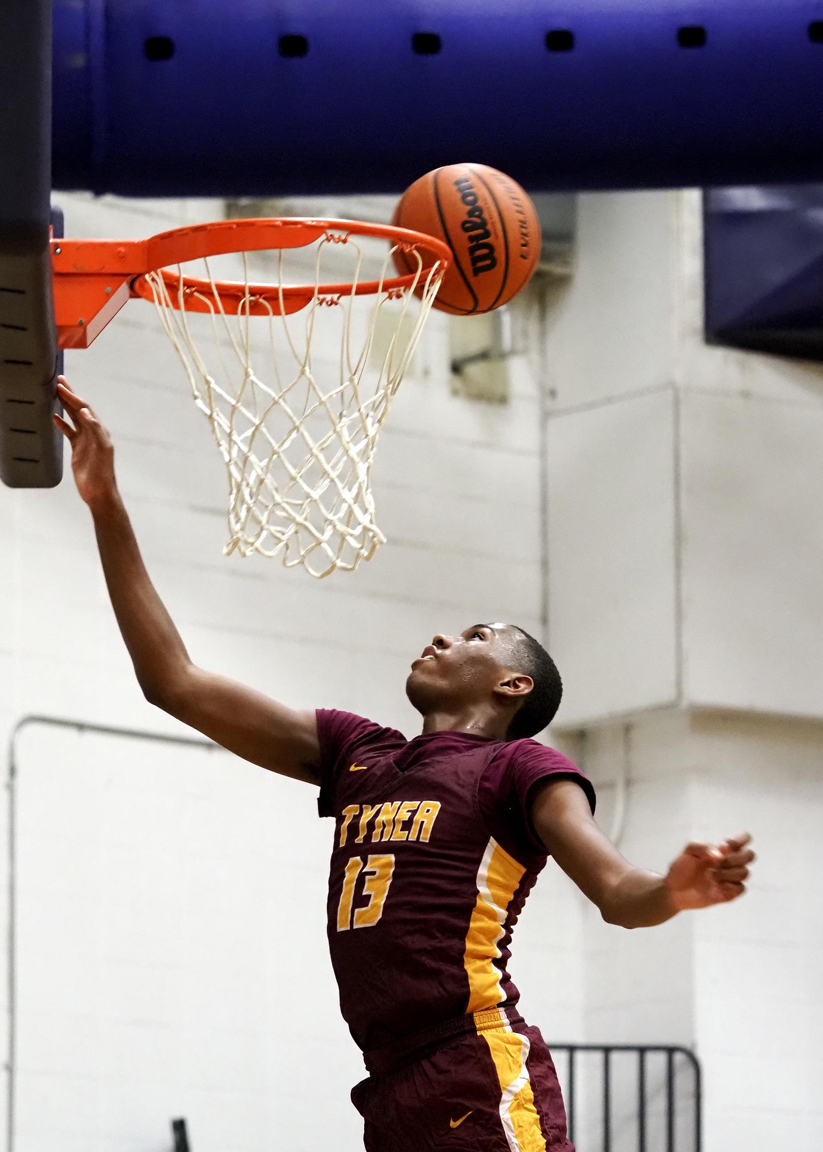 Staff photo by C.B. Schmelter / Tyner's Keelan Jackson (13) eyes the ball on defense against Central at Central High School on Friday, Feb. 12, 2021 in Chattanooga, Tenn.
