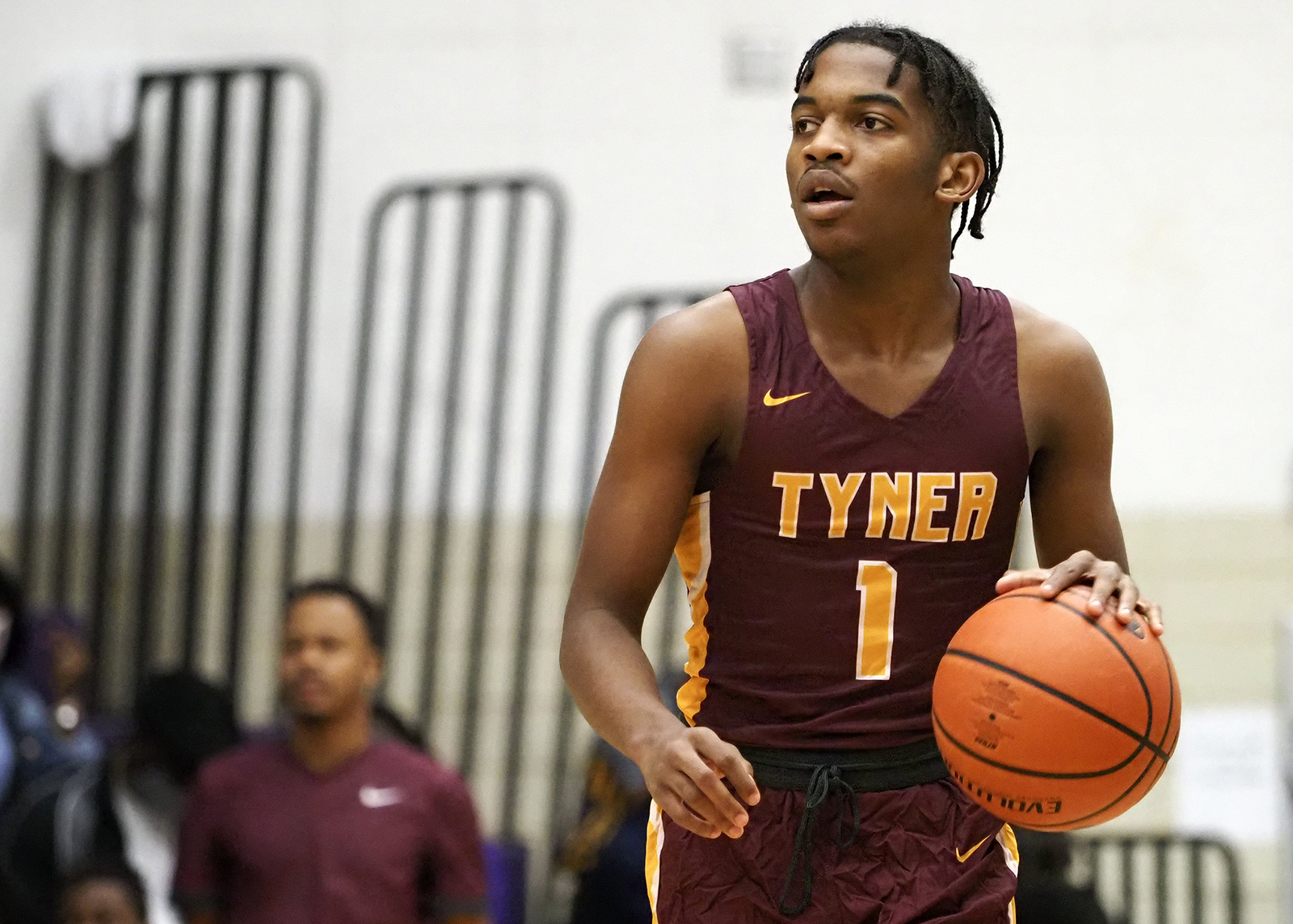 Staff photo by C.B. Schmelter / Tyner's Trent Gresham (1) handles the ball against Central at Central High School on Friday, Feb. 12, 2021 in Chattanooga, Tenn.