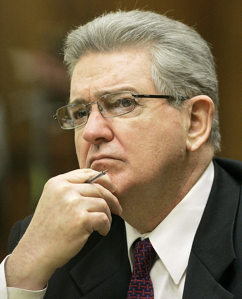 FILE- In this Oct. 15, 2008 file photo, former FBI agent John Connolly listens to the testimony during his trial in Miami. (AP Photo/Alan Diaz, File)


