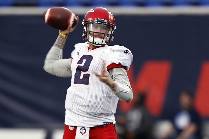 AP photo by Wade Payne / Memphis Express quarterback Johnny Manziel warms up before an American Alliance of Football game against the visiting Birmingham Iron on March 24, 2019. Manziel is now playing for the Zappers of Fan Controlled Football, an arena league in the Atlanta area that kicked off Saturday night.