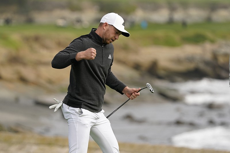 AP photo by Eric Risberg / Daniel Berger reacts after making an eagle putt on the 18th green at Pebble Beach Golf Links to win the AT&T Pebble Beach Pro-Am on Sunday in California. It was his fourth PGA Tour victory.