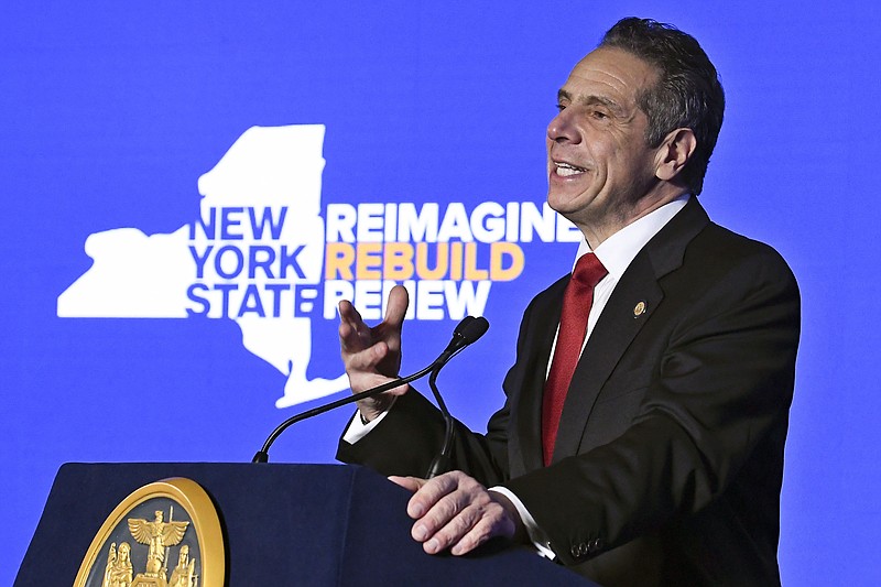 FILE — In this Jan. 11, 2021 file photo, New York Gov. Andrew Cuomo delivers his State of the State address virtually from The War Room at the state Capitol, in Albany, N.Y. In the name of fairness, New York Gov. Andrew Cuomo and his Democratic allies once welcomed the creation of a nonpartisan redistricting commission that would redraw congressional maps free of political influence and avoid contorted gerrymandering.  But now that the commission is stepping up its work, New York Democrats seem to be having second thoughts. The state may lose House seats and, under the old rules, Democrats would have had the power to redraw lines in their favor.  (AP Photo/Hans Pennink, Pool, File)