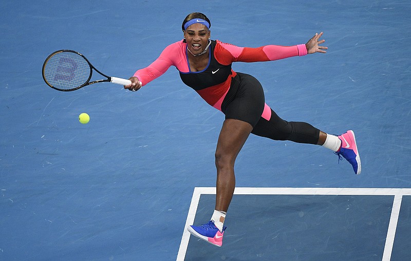 United States' Serena Williams hits a forehand return to Romania's Simona Halep during their quarterfinal match at the Australian Open tennis championship in Melbourne, Australia, Tuesday, Feb. 16, 2021.(AP Photo/Andy Brownbill)