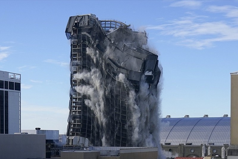 The former Trump Plaza casino is imploded on Wednesday, Feb. 17, 2021, in Atlantic City, N.J. After falling into disrepair, the one-time jewel of former President Donald Trump's casino empire is reduced to rubble, clearing the way for a prime development opportunity on the middle of the Boardwalk, where the Plaza used to market itself as "the center of it all." (AP Photo/Seth Wenig)


