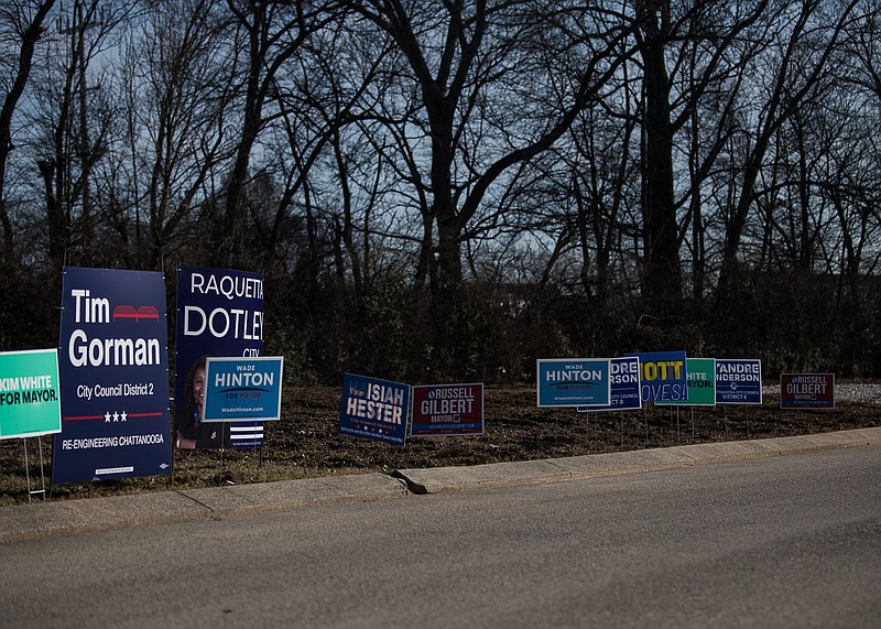 Staff photo by Troy Stolt / Various city candidate signs are seen outside of the Hamilton County Election Commission on Wednesday in Chattanooga, Tenn. Early voting for local elections began Wednesday.