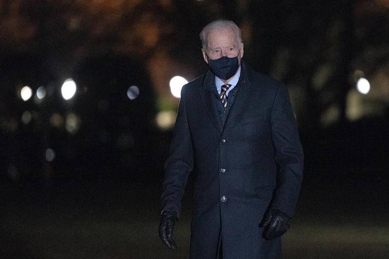 President Joe Biden walks on the South Lawn of the White House after stepping off Marine One, Wednesday, Feb. 17, 2021, in Washington. Biden was returning to Washington after participating in a town hall event in Wisconsin. (AP Photo/Patrick Semansky)


