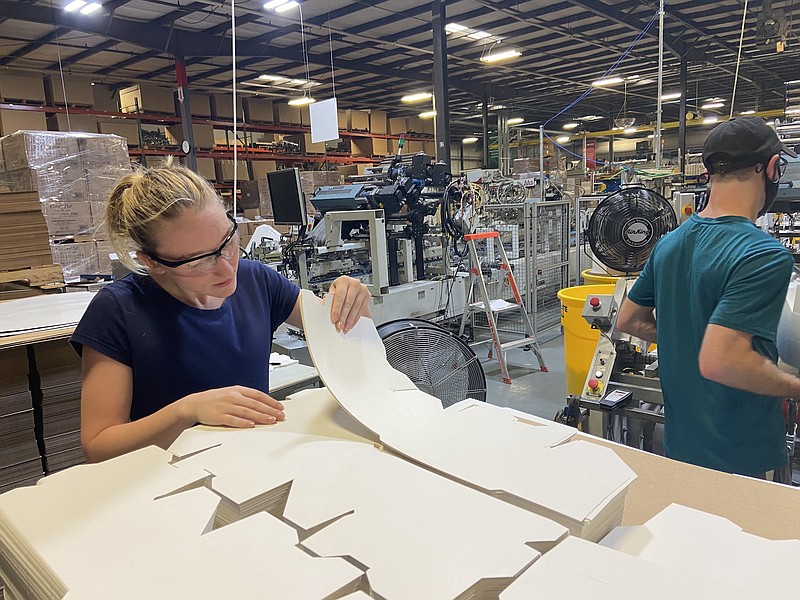 Contributed photo / Amanda Pedde works at a Southern Champion Tray facility in Chattanooga. The company that makes paperboard packaging products is conducting due diligence on a Riverport site to expand.