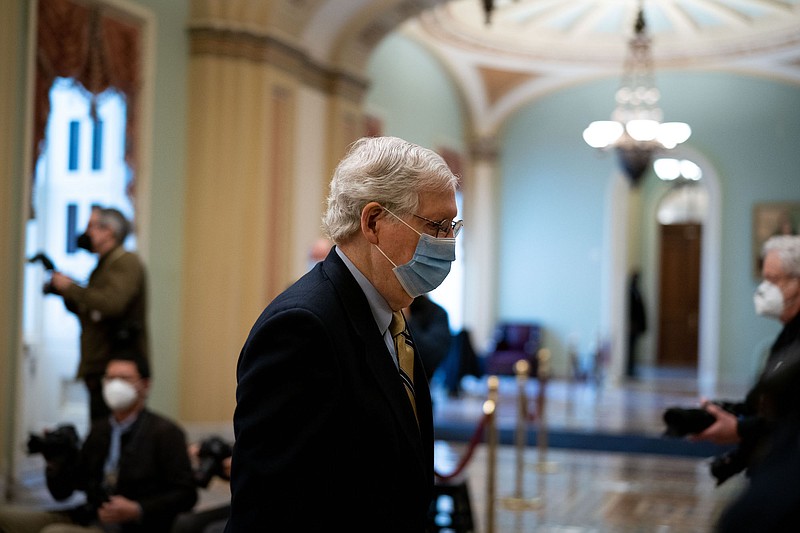 File photo by Anna Moneymaker of The New York Times / Senate Minority Leader Mitch McConnell of Kentucky walks to the Senate Chamber ahead of the fifth day of the impeachment trial of former President Donald Trump in Washington on Feb. 13, 2021.