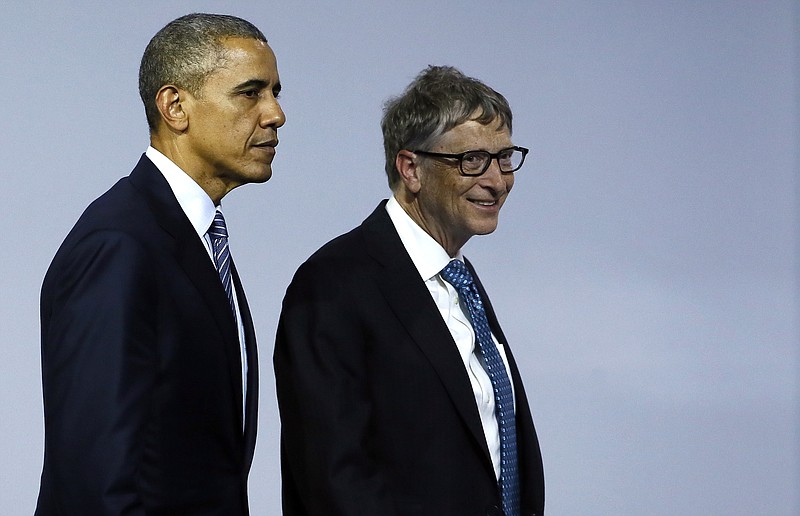 File photo by Ian Langsdon, Pool, via The Associated Press / U.S. President Barack Obama, left, and Microsoft CEO Bill Gates leave after attending the "Mission Innovation: Accelerating the Clean Energy Revolution" meeting at the COP2, United Nations Climate Change Conference in Le Bourget, north of Paris on Monday, Nov. 30 2015.