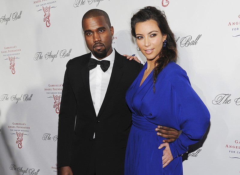 Kanye West, left, and Kim Kardashian attend Gabrielle's Angel Foundation Angel Ball cancer research benefit on Oct. 22, 2012, in New York. Kim Kardashian West filed for divorce Friday, Feb. 19, 2021, from Kanye West after 6 1/2 years of marriage. Sources familiar with the filing but not authorized to speak publicly confirmed that Kardashian filed for divorce in Los Angeles Superior Court. The filing was not immediately available. (Photo by Evan Agostini/Invision/AP, File