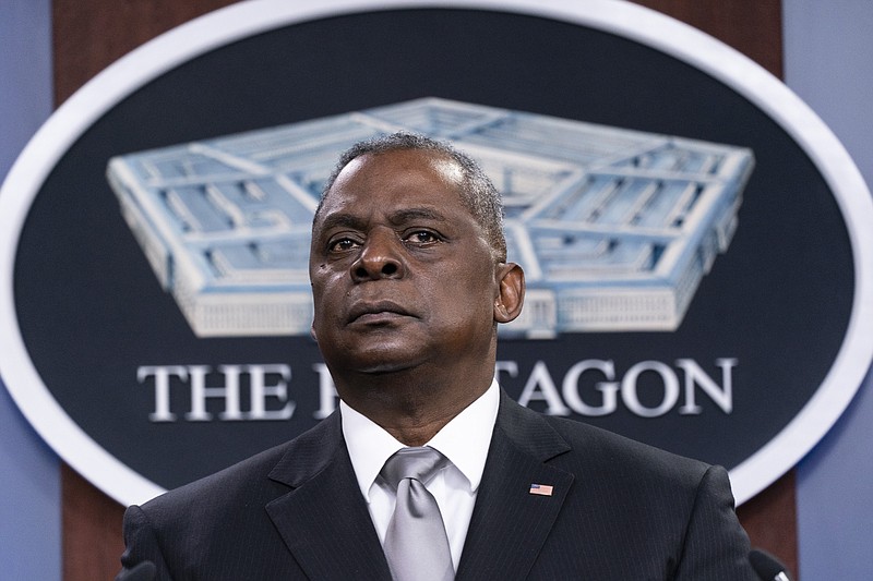 Secretary of Defense Lloyd Austin listens to a question as he speaks during a media briefing at the Pentagon, Friday, Feb. 19, 2021, in Washington. (AP Photo/Alex Brandon)