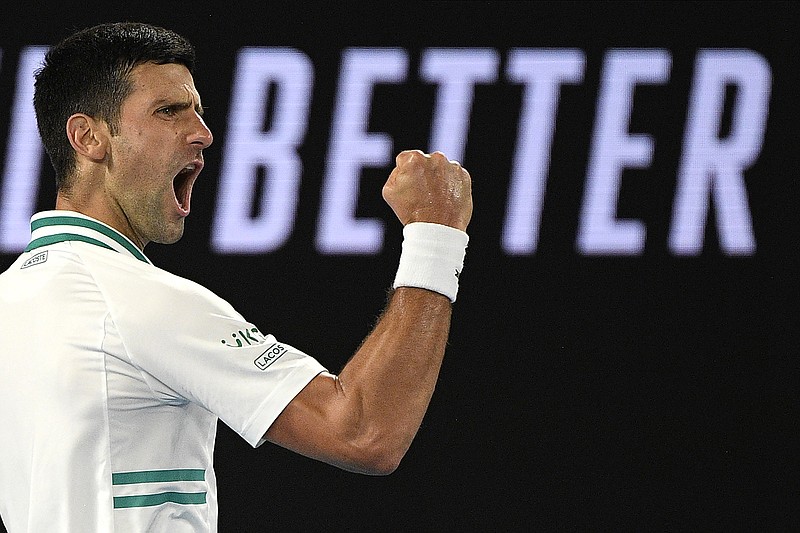 AP photo by Andy Brownbill / Novak Djokovic celebrates winning a point against Daniil Medvedev during their Australian Open final Sunday in Melbourne. Djokovic won the match 7-5, 6-2, 6-2 for his third straight title in the year's first major, his ninth overall there and his 18th Grand Slam championship.