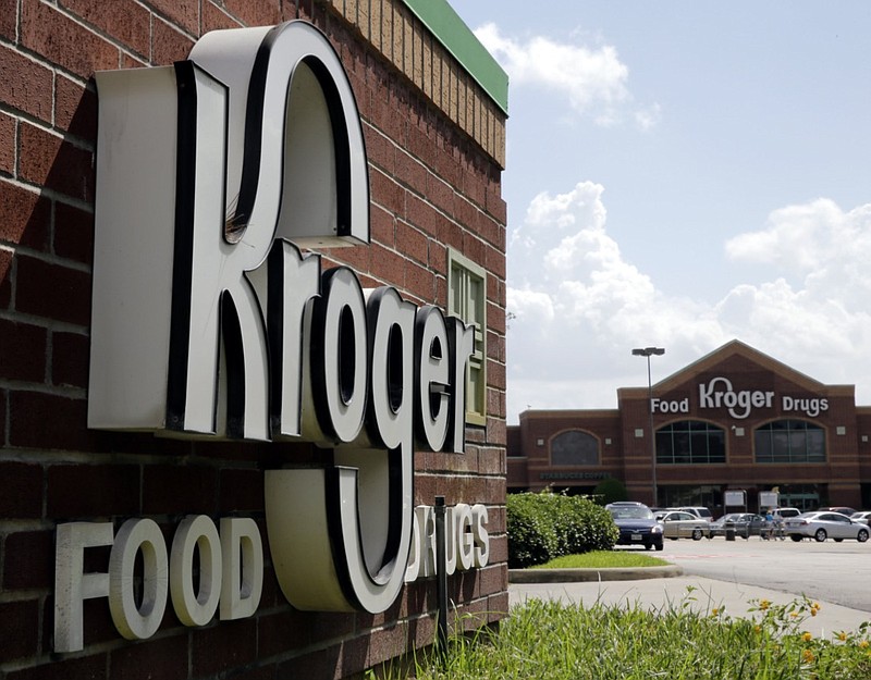 FILE - This June 17, 2014, file photo, shows a Kroger store in Houston. Kroger Co. says it was among the multiple victims of a data breach involving a third-party vendor's file-transfer service and is notifying potentially impacted customers, offering them free credit monitoring. The Cincinnati-based grocery and pharmacy chain said in a statement Friday, Feb. 19, 2021, that it believes less than 1% of its customers were affected, specifically some using its Health and Money Services, as well as some current and former employees because a number of personnel records were apparently viewed. (AP Photo/David J. Phillip, File)