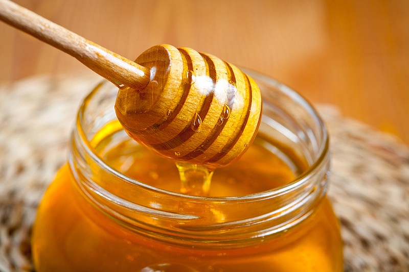 Pot of honey. / Photo credit: Getty Images/iStock/Materio