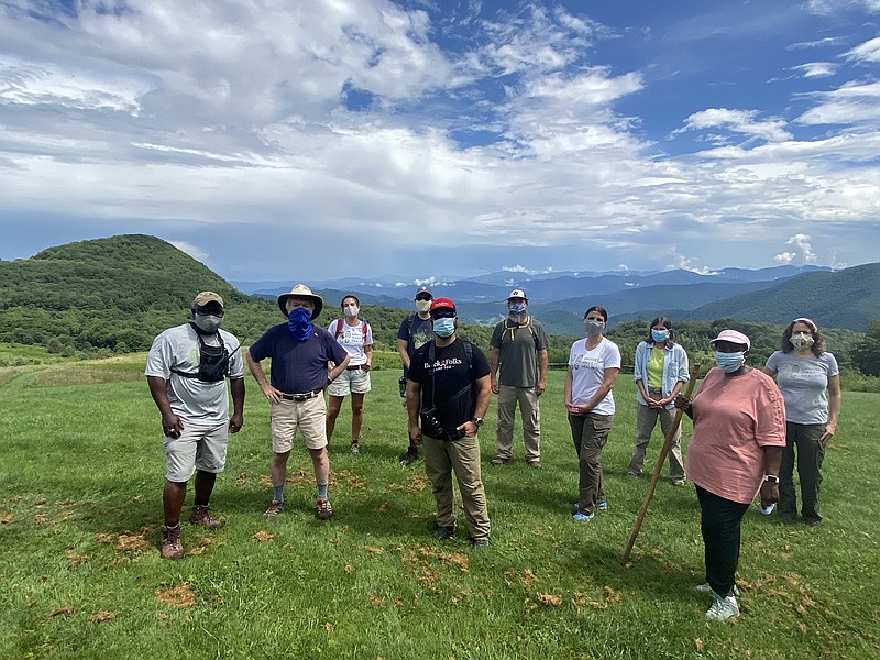 Photo contributed by the National Park Service / Great Smoky Mountains National Park Superintendent Cassius Cash, far left, leads a Smokies Hike for Healing trip in the park last year. The hikes were designed to help people unpack the heavy events of 2020.
