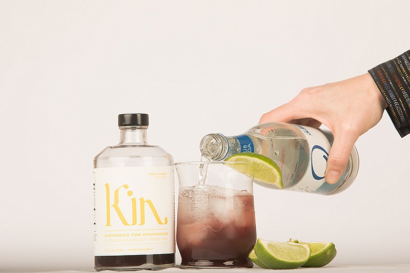 Kin Euphorics recommends mixing its High Rhode, seen here, with club soda and lime. / Staff photo by Troy Stolt