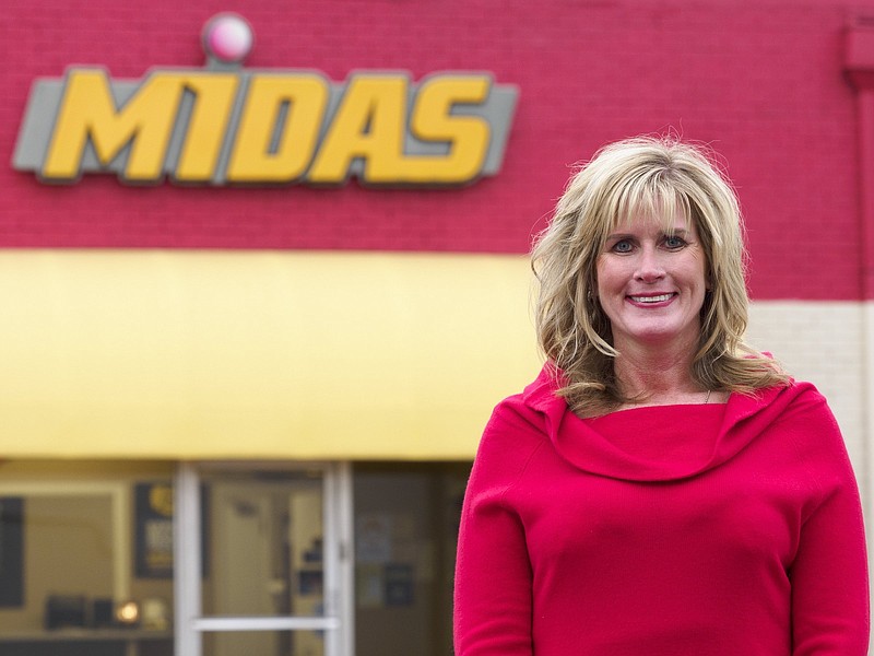 Staff photo by C.B. Schmelter / Franchise owner Angela Scalla-Johnson at her Midas shop on Market Street.