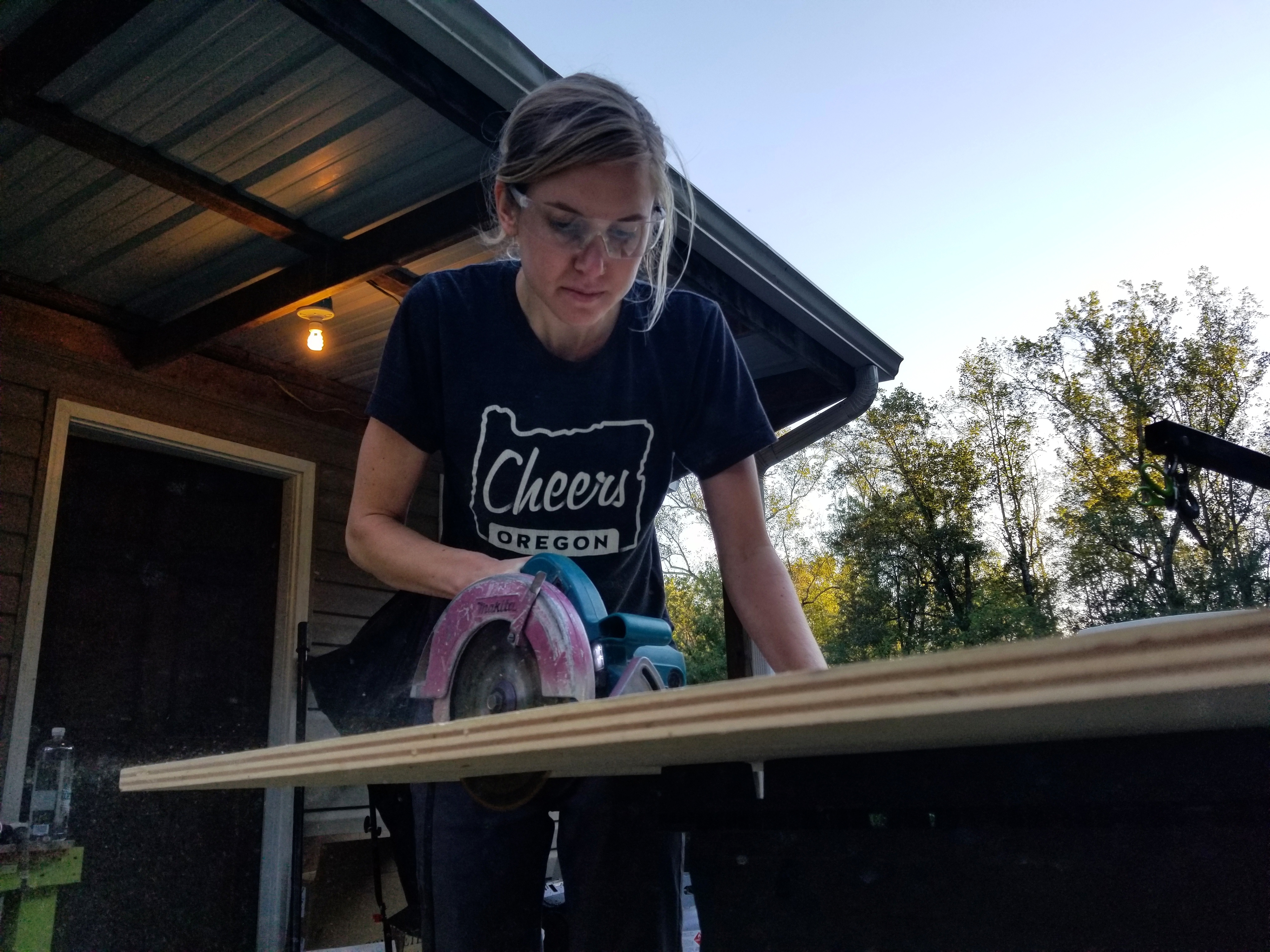 Contributed photo by Eric Hayes / Kaley Hayes builds a bed platform for the Land Rover.
