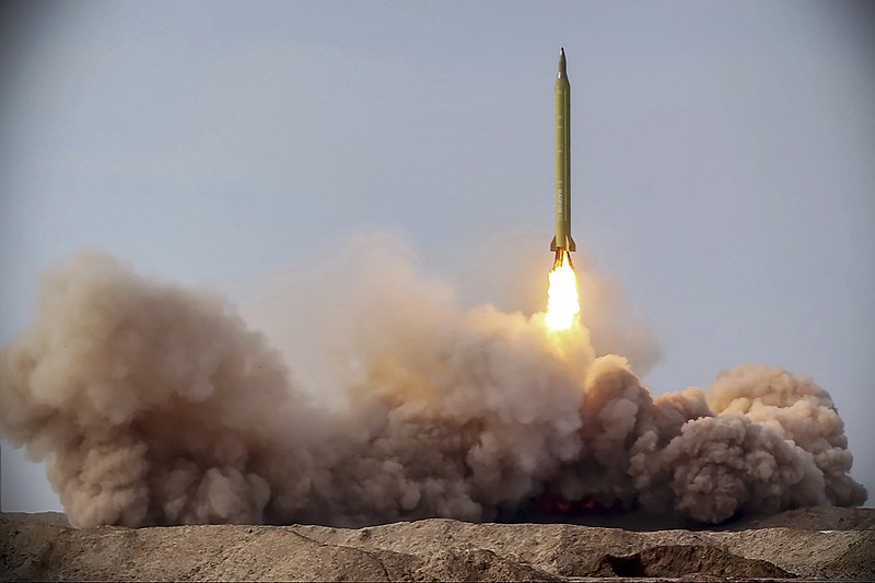 Photo from the Iranian Revolutionary Guard/Sepahnews via The Associated Press / In this photo released on Saturday, Jan. 16, 2021, by the Iranian Revolutionary Guard, a missile is launched in a drill in Iran.