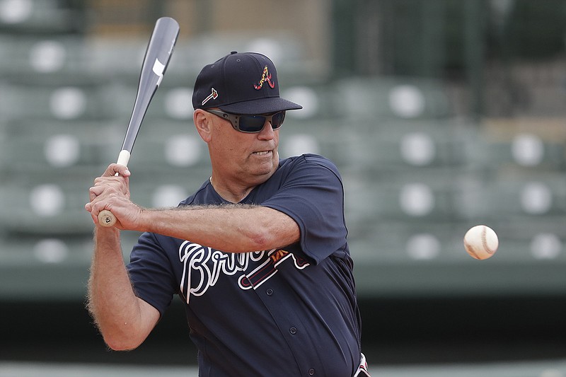 AP file photo by John Bazemore / Brian Snitker heads into what will be his fifth full season as manager of the Atlanta Braves having received a contract extension through 2023 with a club option for 2024.