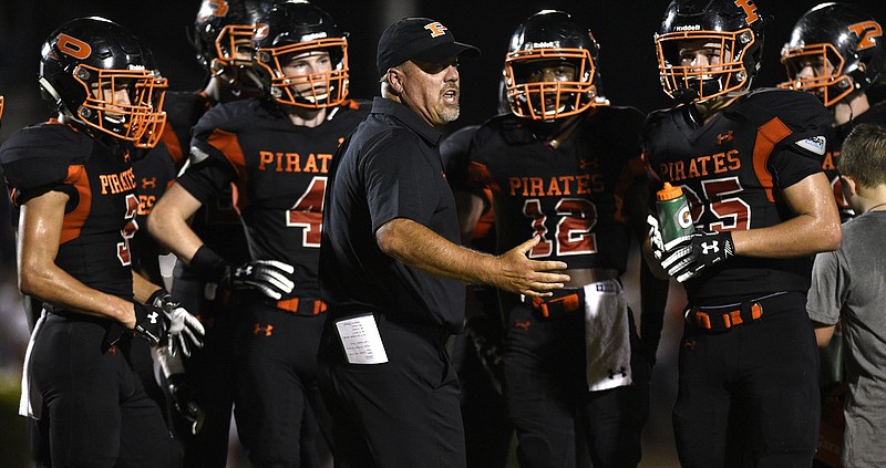 Pirate head coach Vic Grider instructs his team.  The Marion County Warriors visited the South Pittsburg Pirates in a TSSAA rivalry game on September , 2018.  