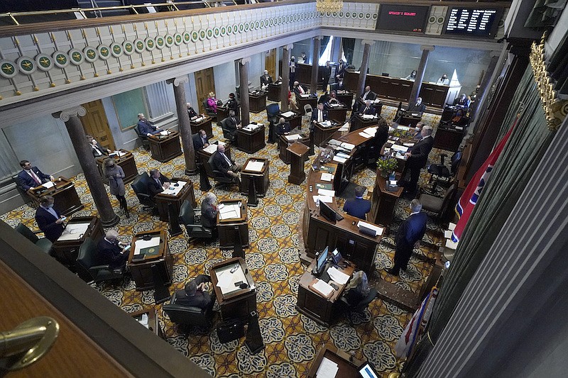 The Tennessee Senate conducts business on the first day of the legislative session Tuesday, Jan. 12, 2021, in Nashville, Tenn. Tennessee lawmakers gathered to start their annual session Tuesday in Nashville amid a pandemic and an FBI probe that drew searches of multiple legislative offices by federal agents last week. (AP Photo/Mark Humphrey)