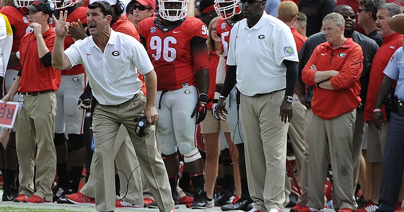 University of Georgia photo by John Kelley / Former Georgia inside linebackers coach Mike Ekeler, shown here shouting instructions from the sideline in 2015, will be the new special teams coordinator at Tennessee.