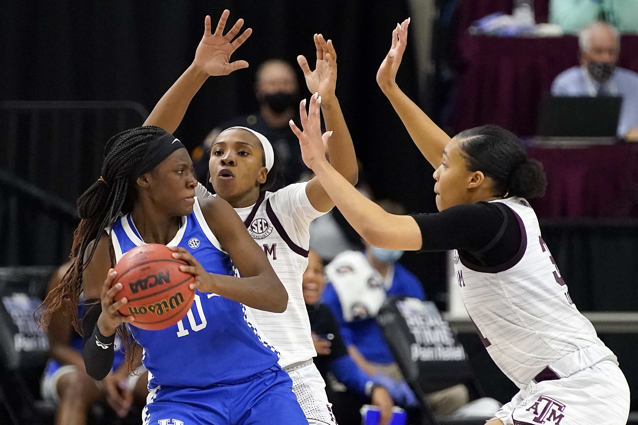 Kentucky guard Rhyne Howard (10) is trapped by Texas A&M guard Aaliyah Wilson (2) and Texas A&M forward N'dea Jones (31) during the second halfof an NCAA college basketball game Thursday, Jan. 7, 2021, in College Station, Texas. (AP Photo/Sam Craft)