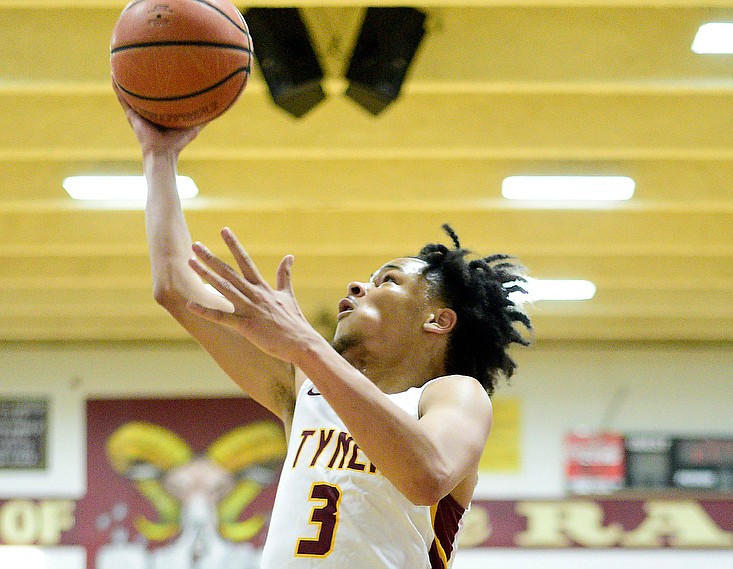 Staff Photo by Robin Rudd / Tyner's Amarion Dillard (3) scores on a layup. The Tyner Rams hosted the Red Bank Lions in the boy's TSSAA Region 3-AA Tournament Semifinals on March 2, 2021.