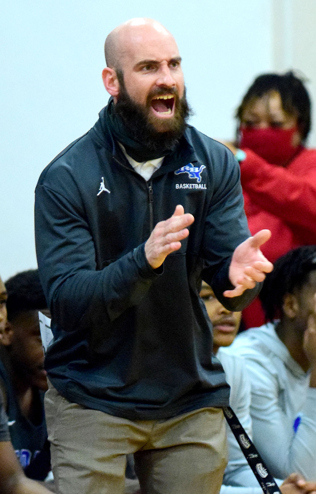 Staff Photo by Robin Rudd / Red Bank head coach Nick Fike urges on the Lions. The Tyner Rams hosted the Red Bank Lions in the boy's TSSAA Region 3-AA Tournament Semifinals on March 2, 2021.