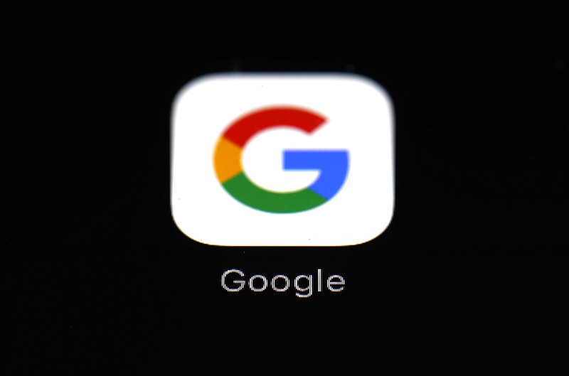 FILE - This March 19, 2018 file photo shows the Google app on an iPad in Baltimore. Google says it won't develop new ways to follow individual users across the internet after it phases out existing ad tracking technology from Chrome browsers in an upcoming overhaul aimed at tightening up privacy. (AP Photo/Patrick Semansky, File)