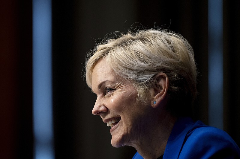 FILE - In this Jan. 27, 2021, file photo, Jennifer Granholm testifies before the Senate Energy and Natural Resources Committee during a hearing to examine her nomination to be Secretary of Energy on Capitol Hill in Washington. The Biden administration is reviving an Energy Department program that dispersed billions of dollars in loan guarantees to companies such as electric car maker Tesla and the failed solar company Solyndra. In an interview with The Associated Press, Energy Secretary Jennifer Granholm says that up to $40 billion in guarantees will be made available for a variety of clean-energy projects. (Jim Watson/Pool via AP, File)