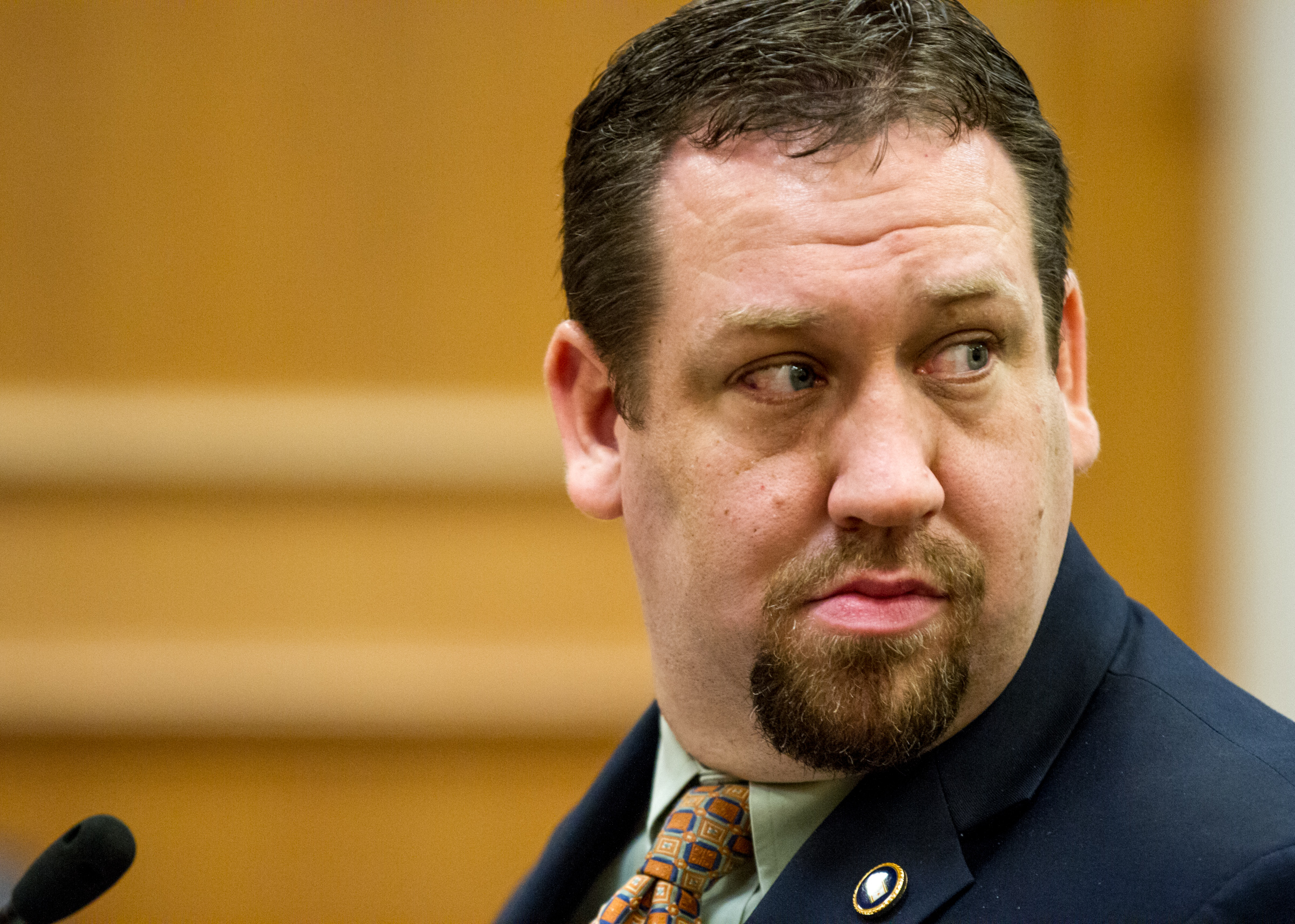 Republican Rep. Jeremy Faison of Cosby looks toward the audience during a discussion of his bill to allow people with handgun carry permits to store firearms in their vehicles no matter where they are parked during a House Civil Justice Committee meeting in Nashville, Tenn., on Wednesday, Feb. 20, 2013. The panel later voted to advance the measure to a full floor vote. (AP Photo/Erik Schelzig)