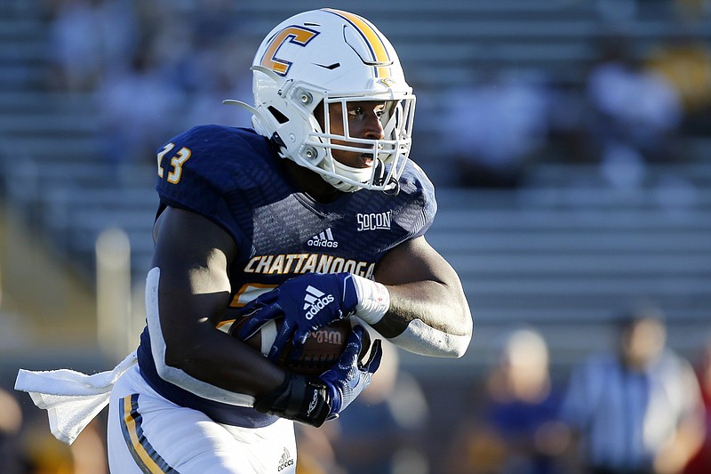 Staff file photo by C.B. Schmelter / UTC running back Tyrell Price scored two touchdowns, including one in overtime, to help the Mocs defeat The Citadel 29-28 on Saturday in Charleston, S.C.