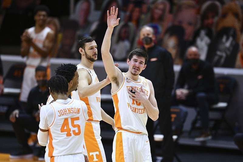 Knoxville News Sentinel photo by Saul Young via AP / A tearful John Fulkerson waves to fans as he leaves the court near the end of Tennessee's win over Florida on Sunday at Thompson-Boling Arena, the regular-season finale for both teams. Fulkerson is a fifth-year senior, and while the NCAA is allowing an extra year of eligibility due to the coronavirus pandemic, he doesn't know if he will return.