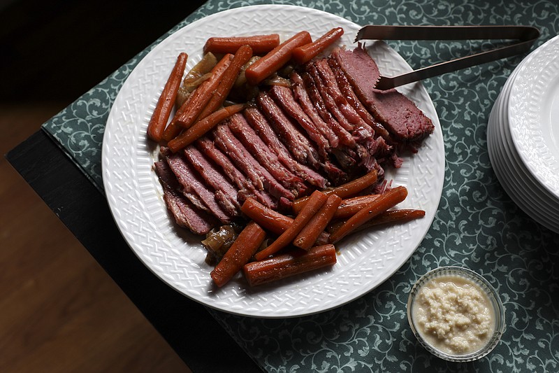 Baked corned beef with caramelized onions and carrots, prepared by chef Shannon Kinsella. / Photo by Abel Uribe/Chicago Tribune/TNS